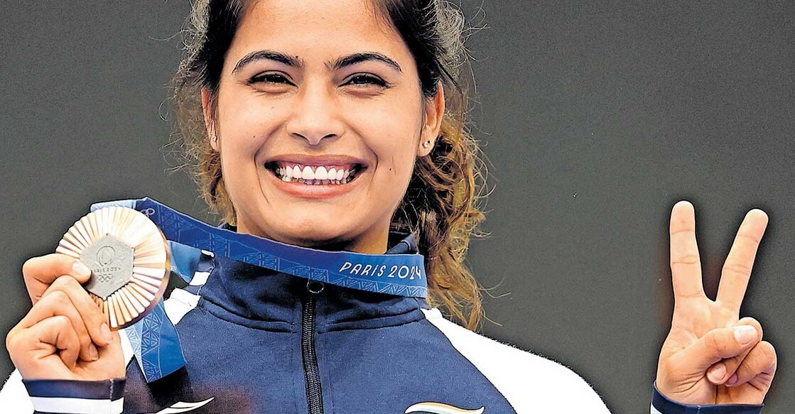 manu-bhaker-bronze പാരിസ് ഒളിംപിക്സിൽ വനിതകളുടെ 10 മീറ്റർ എയർ പിസ്റ്റളിൽ വെങ്കലം നേടിയ മനു ഭാക്കർ മെഡലുമായി. ചിത്രം:പിടിഐ