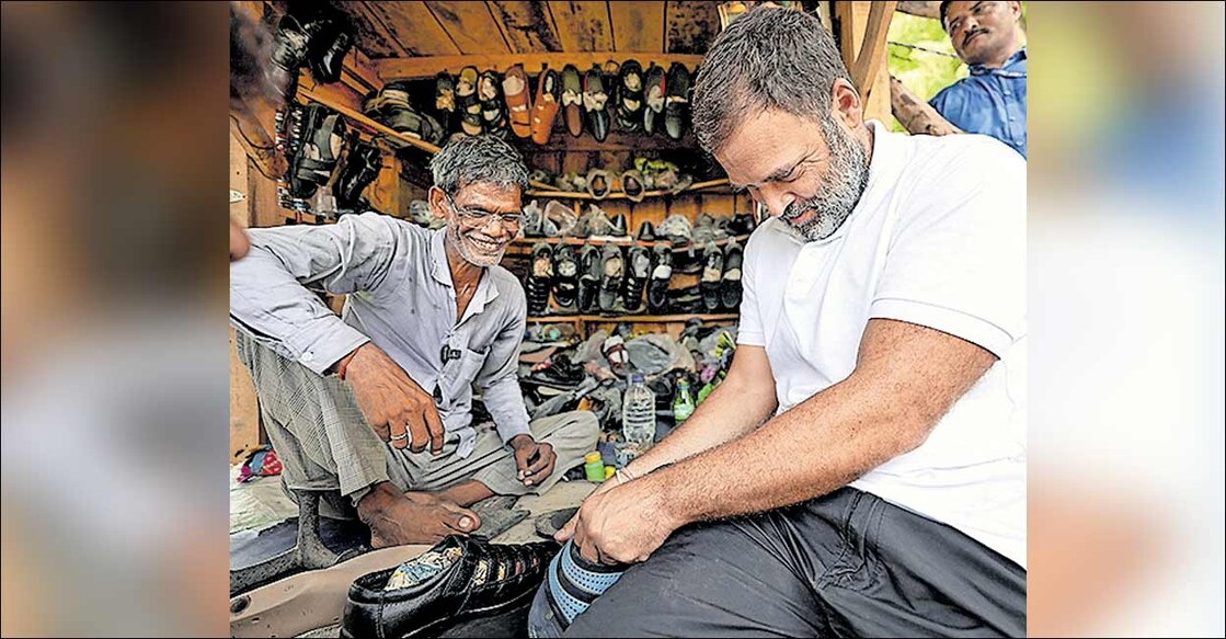 rahul-gandhi രാഹുൽ ഗാന്ധി റാംചേതിന്റെ കടയിൽ ചെരിപ്പു നന്നാക്കുന്നു
