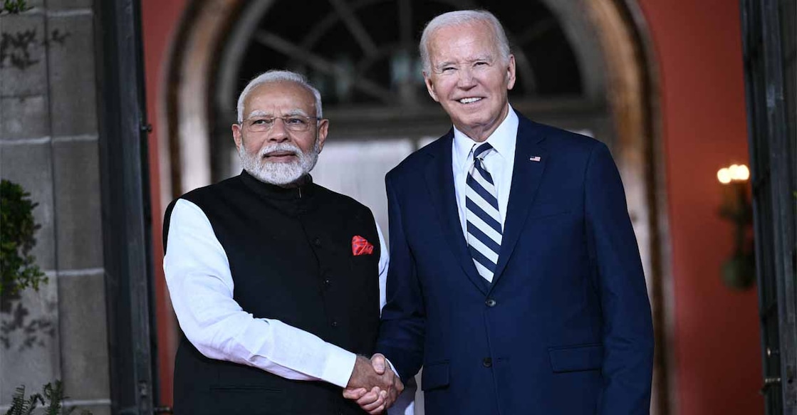 Narendra Modi and Joe Biden യുഎസിലെ വിൽമിങ്ടനിലെത്തിയ പ്രധാനമന്ത്രി നരേന്ദ്ര മോദി
യുഎസ് പ്രസിഡന്റ് ജോ ബൈഡനോടൊപ്പം. (Photo by Brendan SMIALOWSKI / AFP)