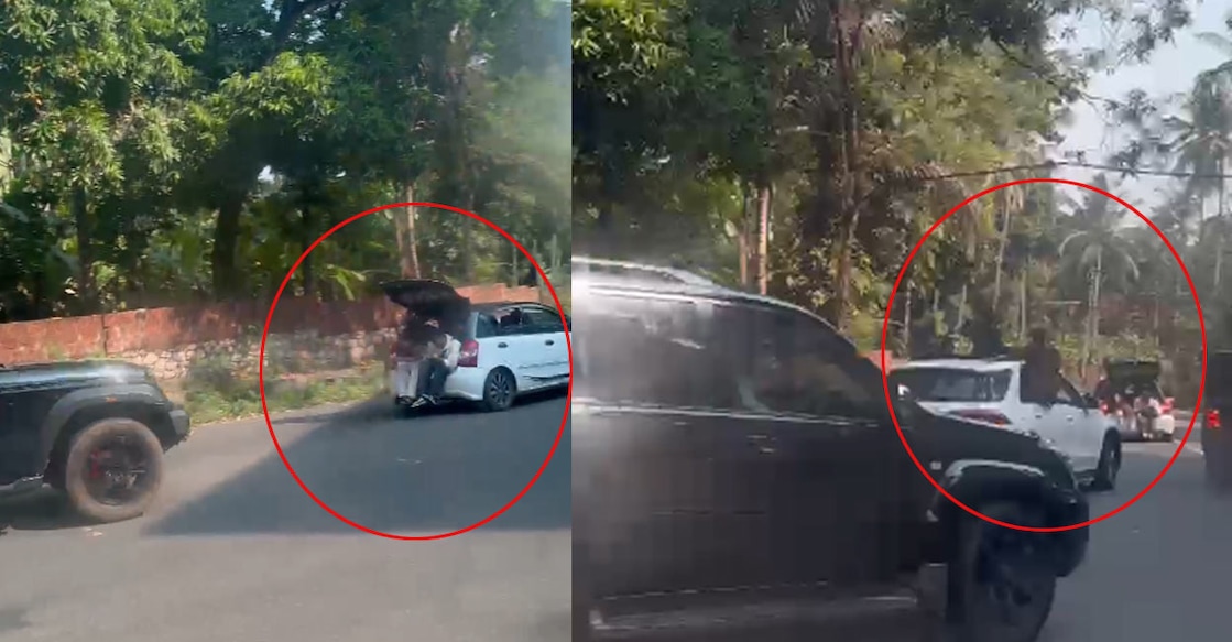 dangerous-travel-in-car യുവാക്കൾ അപകടകരമായ രീതിയിൽ യാത്ര നടത്തുന്ന ദൃശ്യം ( image Credit : video grab)
