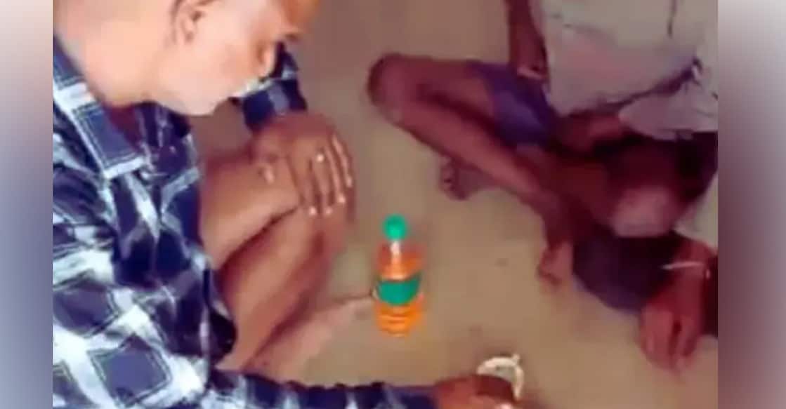 teacher-sharing-liquor പ്രൈമറി സ്കൂൾ വിദ്യാർഥികൾക്ക് മദ്യം ഒഴിച്ചുകൊടുക്കുന്ന ദൃശ്യം (Photo Special Arrangement)
