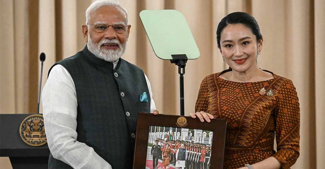 Narendra Modi, Paetongtarn Shinawatra നരേന്ദ്ര മോദി, പയേതുങ്താൻ ഷിനവത്ര (Photo by Lillian SUWANRUMPHA / AFP)