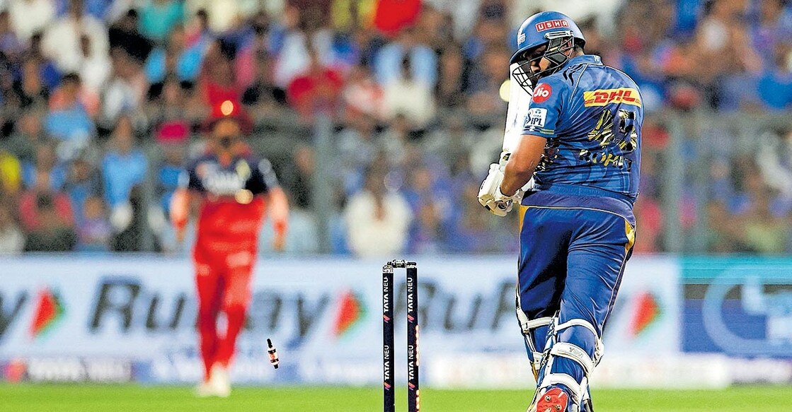 rohit-sharma ബെംഗളൂരു ബോളർ യഷ് ദയാലിന്റെ പന്തിൽ രോഹിത് ശർമ ക്ലീൻ ബോൾഡായപ്പോൾ.