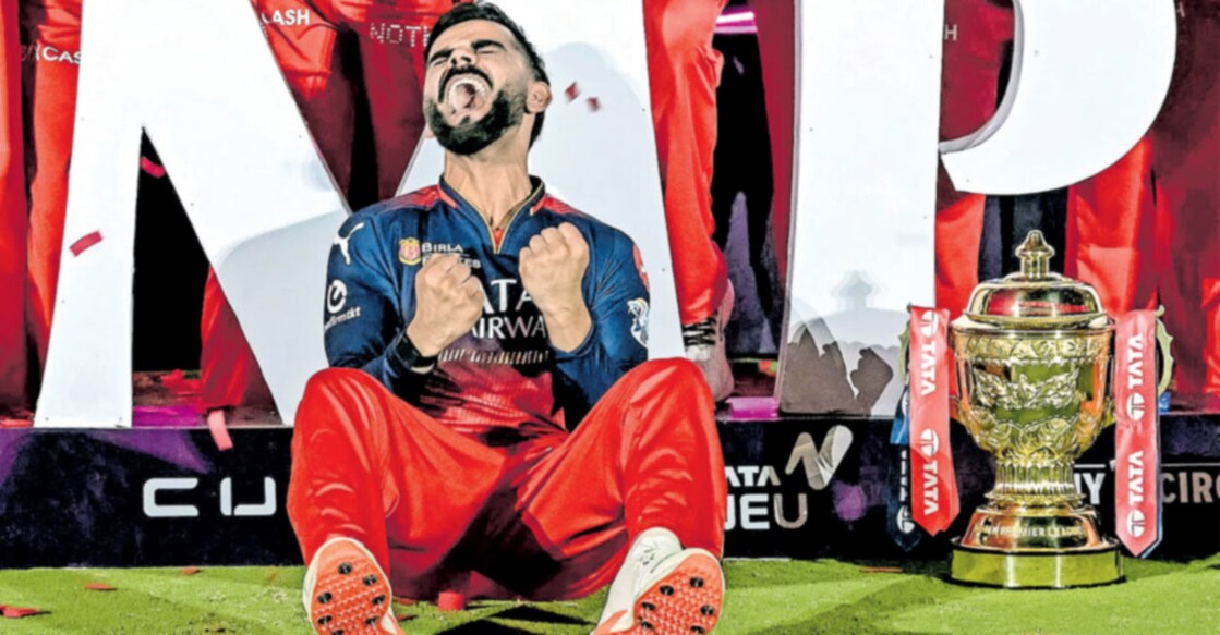 ഐപിഎൽ ട്രോഫിക്കു സമീപം ആഹ്ലാദത്തോടെ വിരാട് കോലി 