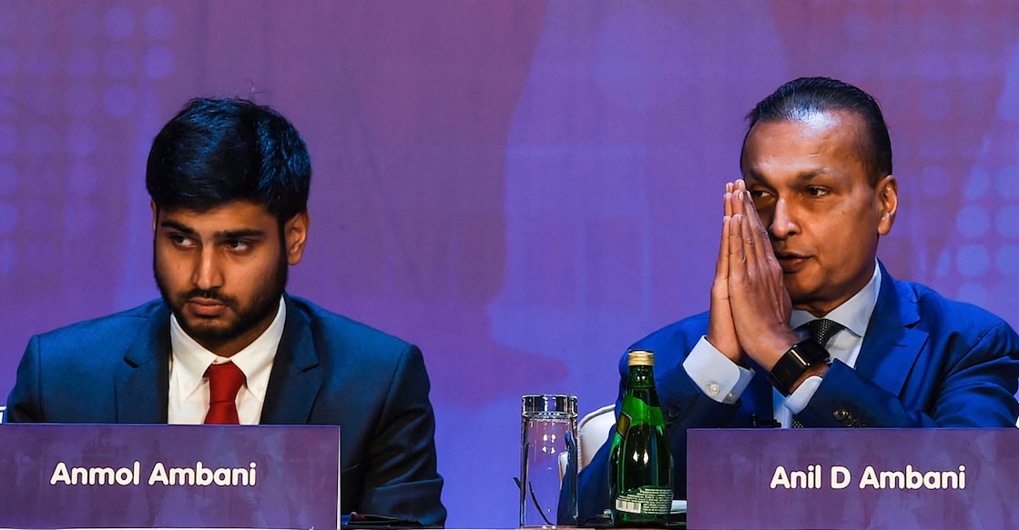 INDIA-ECONOMY-RELIANCE-AMBANI അനിൽ അംബാനിയും ജയ് അൻമോൽ അംബാനിയും. (Photo by Indranil MUKHERJEE / AFP)