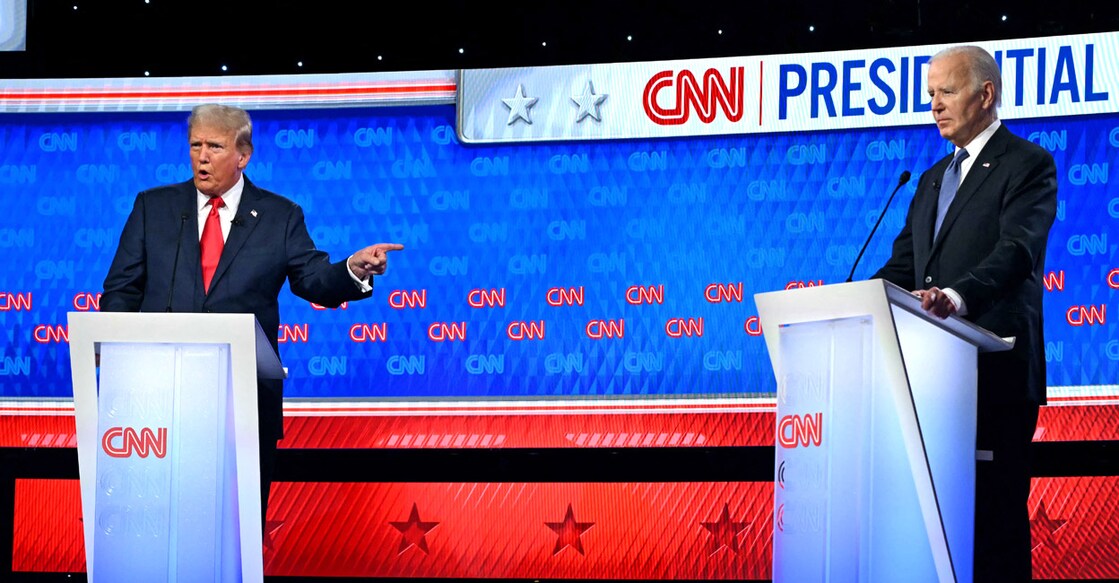 US President Joe Biden and former US President and Republican presidential candidate Donald Trump participate in the first presidential debate of the 2024 elections at CNN's studios in Atlanta, Georgia, on June 27, 2024. (Photo by ANDREW CABALLERO-REYNOLDS / AFP)