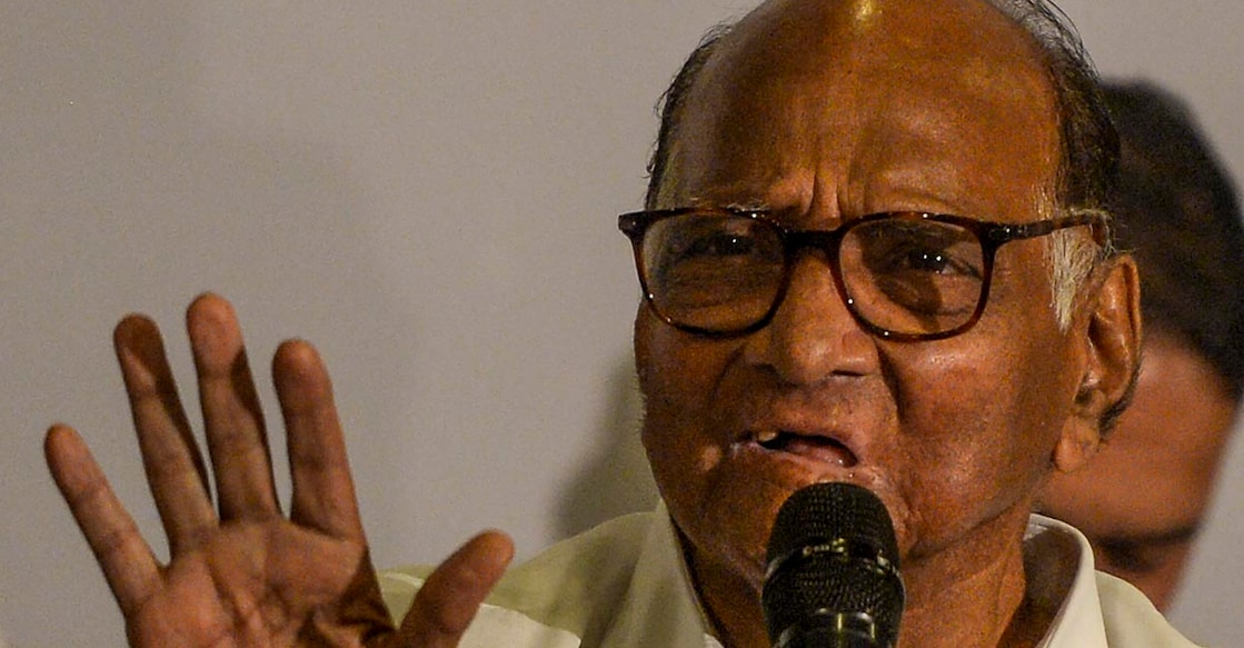 INDIA-POLITICS-VOTE National Congress party president Sharad Pawar gestures as he speaks during a press conference in Mumbai on November 12, 2019. (Photo by Punit PARANJPE / AFP)