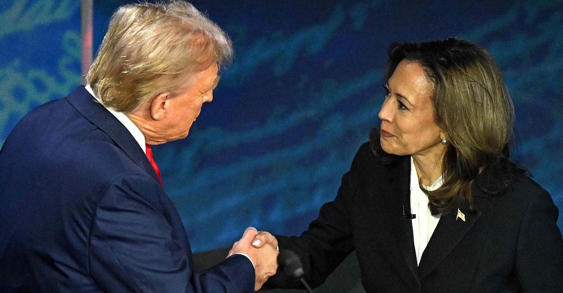 US Vice President and Democratic presidential candidate Kamala Harris (R) shakes hands with former US President and Republican presidential candidate Donald Trump during a presidential debate at the National Constitution Center in Philadelphia, Pennsylvania, on September 10, 2024. (Photo by SAUL LOEB / AFP)