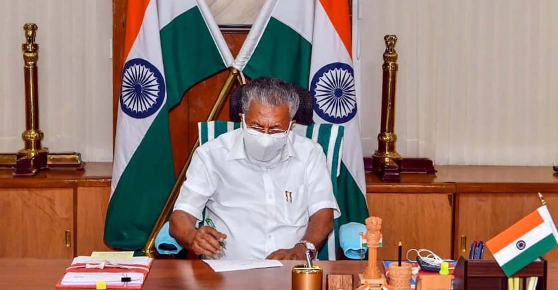 Thiruvananthapuram: Kerala Chief Minister Pinarayi Vijayan takes charge for the second consecutive term at the State Secretariat in Thiruvananthapuram, Thursday, May 20, 2021. (PTI Photo)  (PTI05_20_2021_000173B)