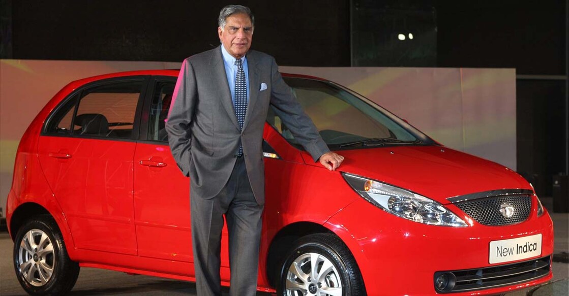 A-100, DEL-090138,  JANUARY 09, 2008:  New Delhi: Chairman, Tata Sons, Ratan Tata poses next to the new Direct Injection Common Rail (DICOR) version Indica vehicle, at it's launch at the 9th Auto Expo in New Delhi on Wednesday,. PTI Photo by Kamal Singh