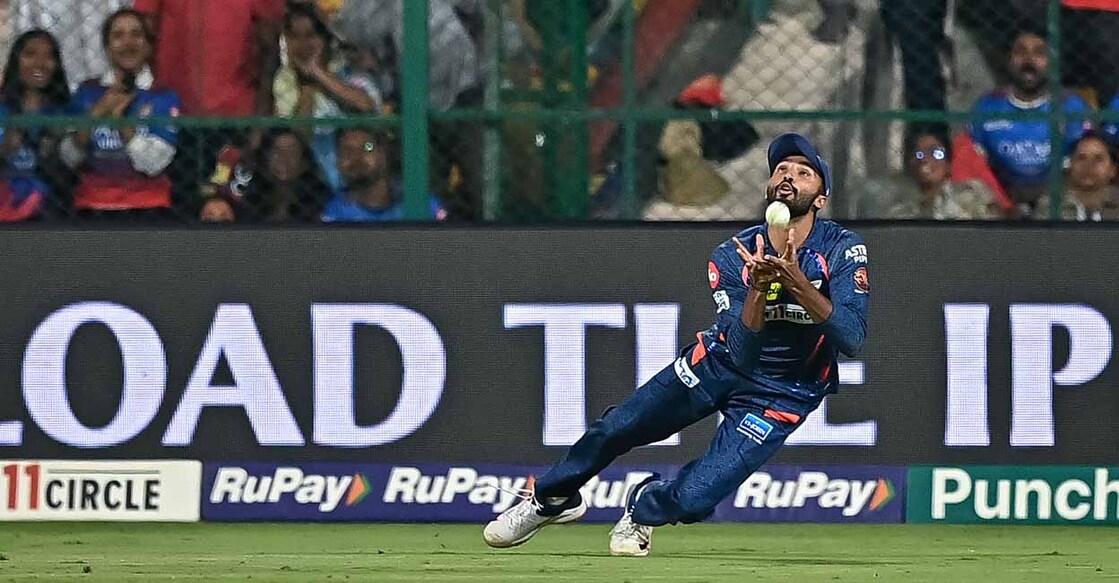 CRICKET-IND-IPL-T20-BENGALURU-LUCKNOW Lucknow Super Giants' Devdutt Padikkal takes a catch to dismiss Royal Challengers Bengaluru's Rajat Patidar during the Indian Premier League (IPL) Twenty20 cricket match between Royal Challengers Bengaluru and Lucknow Super Giants at the M Chinnaswamy Stadium in Bengaluru on April 2, 2024. (Photo by Idrees MOHAMMED / AFP) / -- IMAGE RESTRICTED TO EDITORIAL USE - STRICTLY NO COMMERCIAL USE -- - -- IMAGE RESTRICTED TO EDITORIAL USE - STRICTLY NO COMMERCIAL USE --