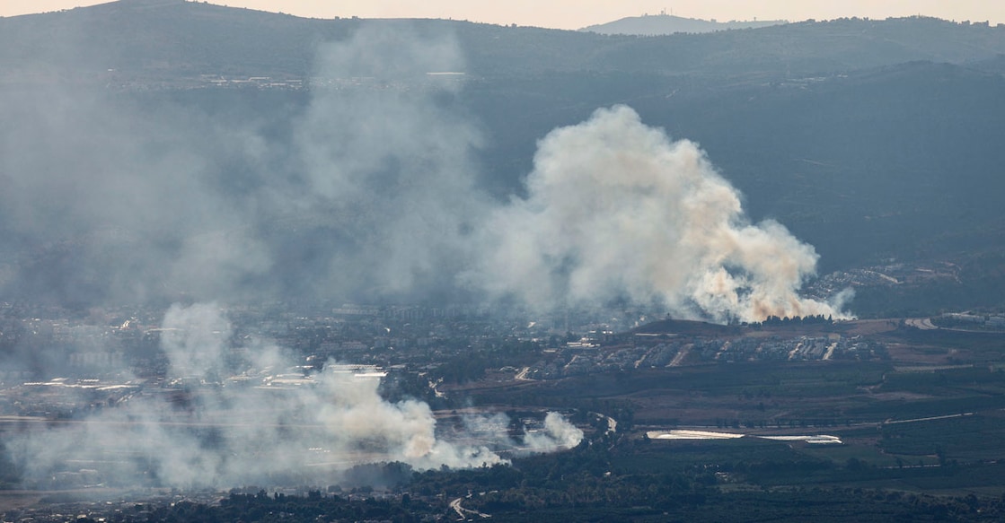 ISRAEL-LEBANON-PALESTINIAN-CONFLICT Smoke billows after a hit from rockets fired from southern Lebanon over the Upper Galilee region in northern Israel on September 18, 2024. (Photo by Jalaa MAREY / AFP)