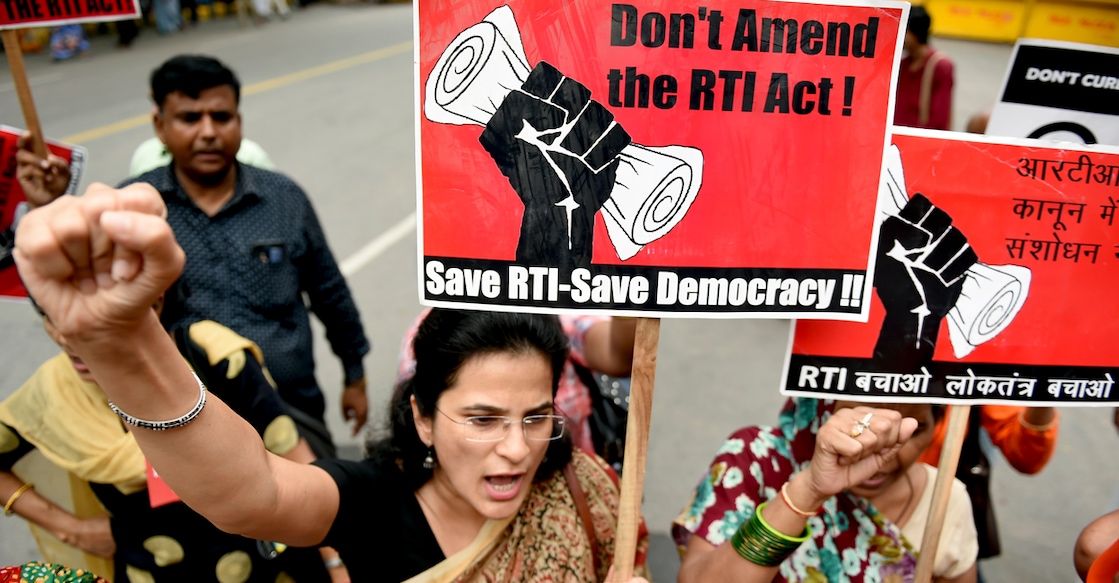 Activists shout slogans during a protest against the amendments to the Right to Information (RTI) Act in the Lok Sabha of the Indian parliament, in New Delhi on July 25, 2019. (Photo by Money SHARMA / AFP)