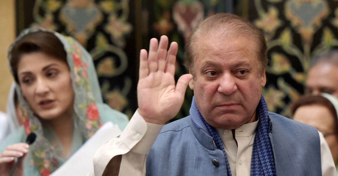 Ousted Pakistani prime minister Nawaz Sharif gestures as he leaves after attending a press conference of his daughter Maryam Nawaz (L) in Islamabad on May 29, 2018. Pakistan will hold general elections on July 25, a presidential spokesman said, offering the prospect of what would be only the second ever democratic transfer of power in the nuclear-armed country. (Photo by AAMIR QURESHI / AFP)