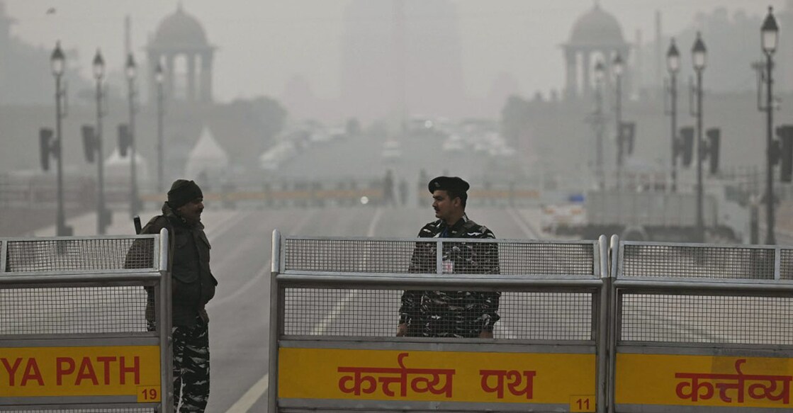 Security personnel stand guard at the Kartavya Path ahead of India's upcoming Republic Day parade in New Delhi on January 23, 2024. (Photo by Arun SANKAR / AFP)