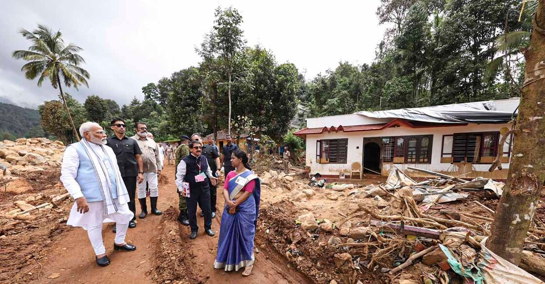 **EDS: IMAGE VIA PMO** Wayanad: Prime Minister Narendra Modi interacts with officials during inspection of the landslide-affected areas, in Wayanad district, Saturday, Aug. 10, 2024. MoS Suresh Gopi is also seen. (PTI Photo)(PTI08_10_2024_000273B)