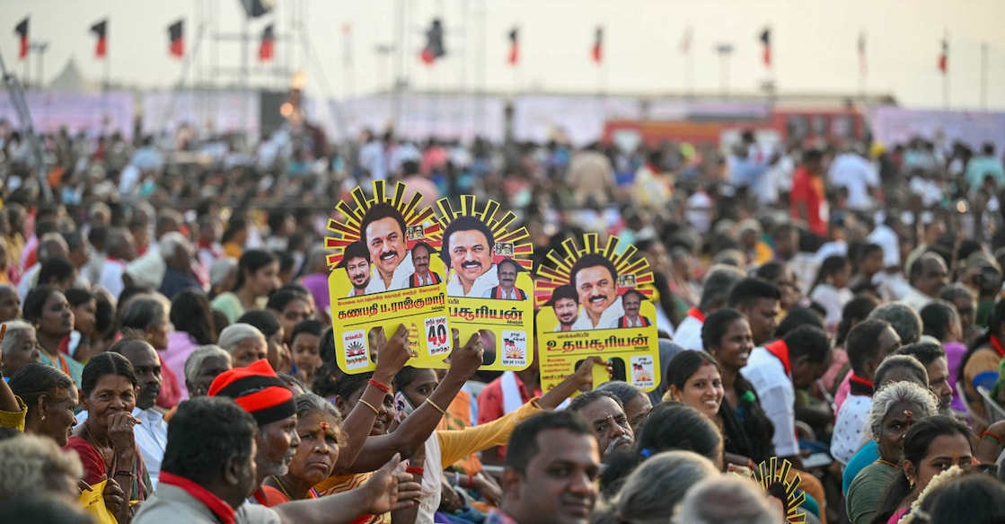 Supporters of Indian National Congress party leader Rahul Gandhi and Tamil Nadu's Chief Minister M.K Stalin, attend a public meeting in Coimbatore on April 12, 2024, ahead of the country's general elections. (Photo by R.Satish BABU / AFP)