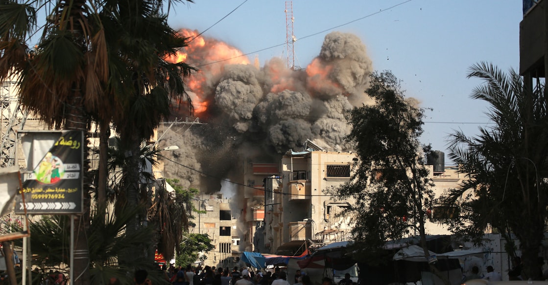 A ball of fire and black smoke rises moments after an Israeli air strike targeted a residential building in the city of Bureij in the central Gaza Strip on June 3, 2024, amid the ongoing conflict between Israel and the Palestinian Hamas militant group. (Photo by Bashar TALEB / AFP)