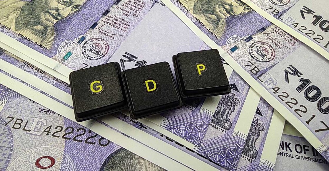 indian currency and gdp word spelled out