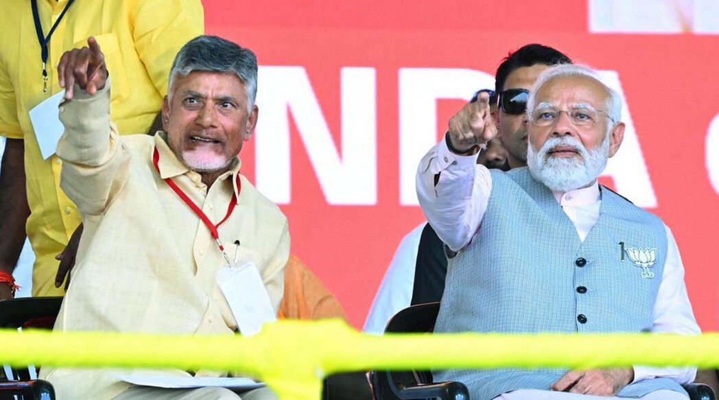 Palnadu: Prime Minister Narendra Modi with TDP chief N Chandrababu Naidu during a public meeting in Palnadu, Sunday, March 17, 2024. (PTI Photo)   (PTI03_17_2024_000307A)