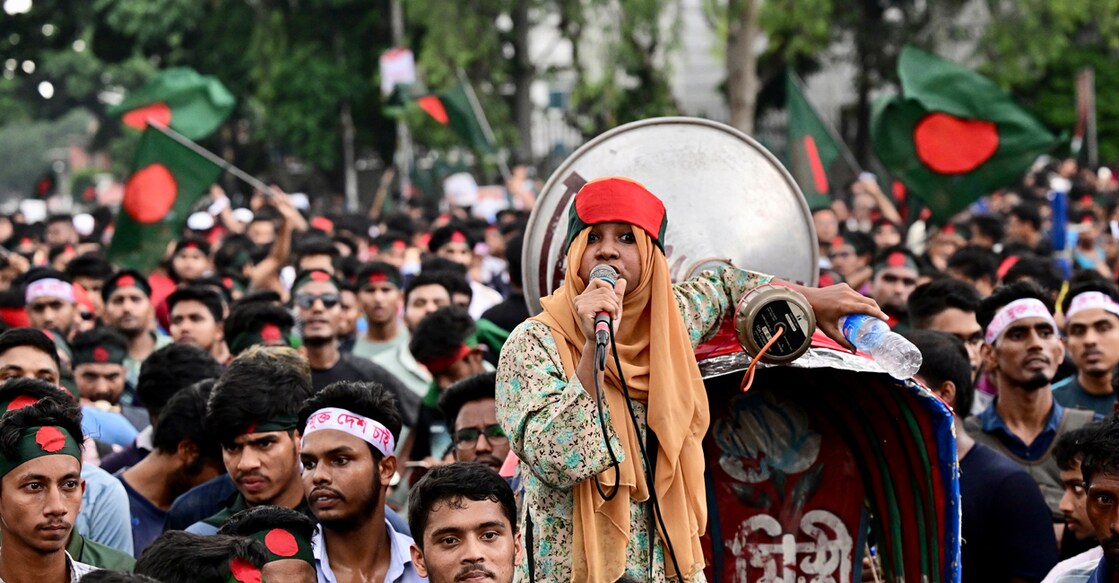 Student activists shout slogans before they submit their memorandum to the country’s President on quota reforms for civil service jobs, during a demonstration held in Dhaka on July 14, 2024. (Photo by MUNIR UZ ZAMAN / AFP)