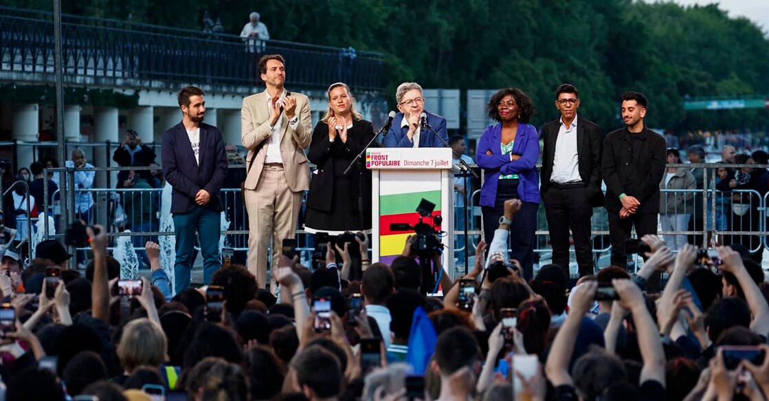 FRANCE-POLITICS-VOTE ഫ്രഞ്ച് പാർലമെന്റ് തിരഞ്ഞെടുപ്പിൽ മുന്നിലെത്തിയ ഇടതുസഖ്യത്തിലെ മുഖ്യപാർട്ടിയായ ‘ഫ്രാൻസ് അൻബൗഡി’ന്റെ മുതിർന്ന നേതാവ് ഴാൻ ലുക് മിലോഷൻ വിജയാഘോഷ സമ്മേളനത്തിൽ പ്രസംഗിക്കുന്നു. Photo by Sameer Al-Doumy / AFP)