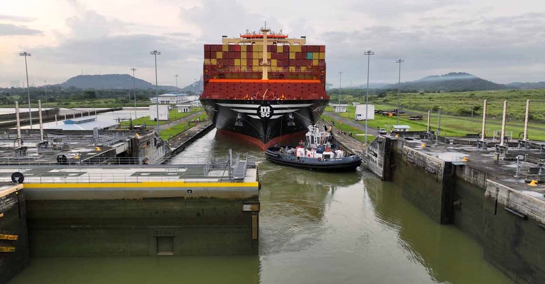 This handout picture released by the Panama Canal Authority on August 30, 2024, shows the container ship MSC Marie, of 366 meters long and 51 meters wide, transiting the Panama Canal in Panama. For its transit, it paid a toll of US$1,361,742. - A vessel capable of carrying 17,640 containers broke the record on Friday as the vessel with the largest capacity to cross the Panama Canal in its 110 years of operation, the Panama Canal Authority announced. (Photo by Handout / Panama Canal Authority / AFP) / RESTRICTED TO EDITORIAL USE - MANDATORY CREDIT "AFP PHOTO / PANAMA CANAL AUTHORITHY " - NO MARKETING NO ADVERTISING CAMPAIGNS - DISTRIBUTED AS A SERVICE TO CLIENTS