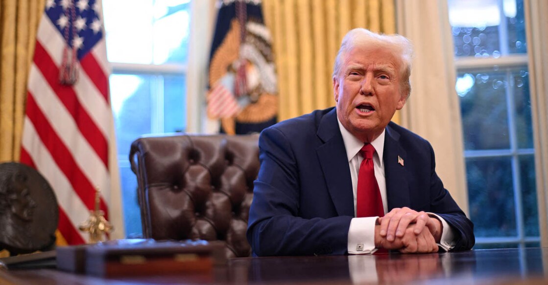 US President Donald Trump speaks to journalists in the Oval Office of the White House in Washington, DC, on January 30, 2025. (Photo by ROBERTO SCHMIDT / AFP)