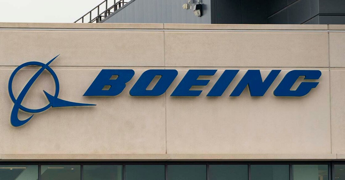 SEATTLE, WASHINGTON - OCTOBER 24: A Boeing sign is seen on the exterior of a building as Boeing workers gather on a picket line near the entrance to a Boeing facility during an ongoing strike on October 24, 2024 in Seattle, Washington. Yesterday, members of the International Association of Machinists and Aerospace Workers District 751 voted to reject Boeing's latest contract offer.   David Ryder/Getty Images/AFP (Photo by David Ryder / GETTY IMAGES NORTH AMERICA / Getty Images via AFP)