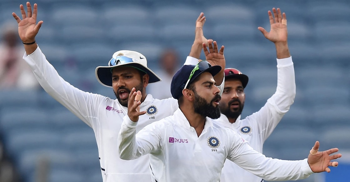 CRICKET-IND-RSA രോഹിത് ശർമ, വിരാട് കോലി, അജിൻക്യ രഹാനെ. (Photo by PUNIT PARANJPE / AFP)