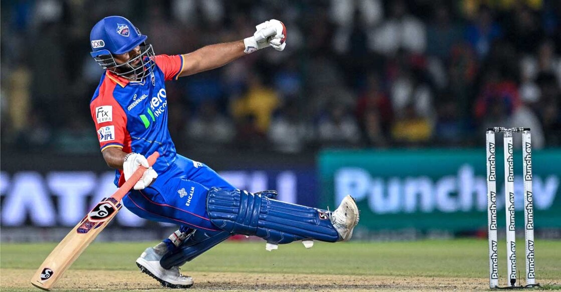 Delhi Capitals' captain Rishabh Pant falls on the ground after playing a shot during the Indian Premier League (IPL) Twenty20 cricket match between Delhi Capitals and Sunrisers Hyderabad at the Arun Jaitley Stadium in New Delhi on April 20, 2024. (Photo by Money SHARMA / AFP) / -- IMAGE RESTRICTED TO EDITORIAL USE - STRICTLY NO COMMERCIAL USE --