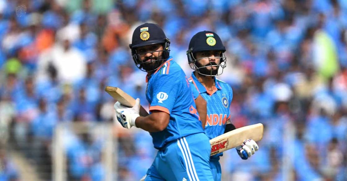 India's captain Rohit Sharma (L) and his teammate Virat Kohli run between the wickets during the 2023 ICC Men's Cricket World Cup one-day international (ODI) final match between India and Australia at the Narendra Modi Stadium in Ahmedabad on November 19, 2023. (Photo by Punit PARANJPE / AFP) / -- IMAGE RESTRICTED TO EDITORIAL USE - STRICTLY NO COMMERCIAL USE -- - -- IMAGE RESTRICTED TO EDITORIAL USE - STRICTLY NO COMMERCIAL USE --