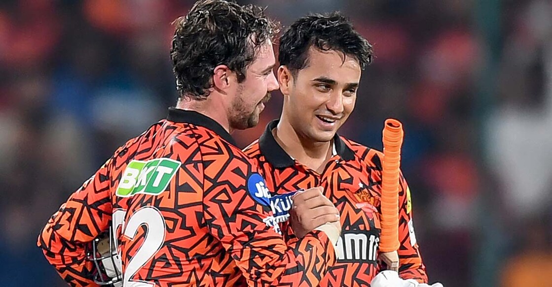 Sunrisers Hyderabad's Travis Head (L) and Abhishek Sharma celebrate their win against Lucknow Super Giants at the Indian Premier League (IPL) Twenty20 cricket match in the Rajiv Gandhi International Stadium of Hyderabad on May 8, 2024. (Photo by Noah SEELAM / AFP) / -- IMAGE RESTRICTED TO EDITORIAL USE - STRICTLY NO COMMERCIAL USE --