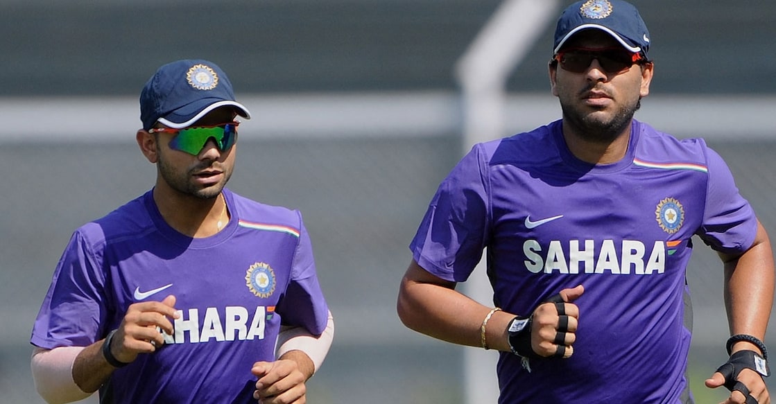 CRICKET-IND-TRAINING വിരാട് കോലിയും യുവരാജ് സിങ്ങും. Photo: INDRANIL MUKHERJEE / AFP