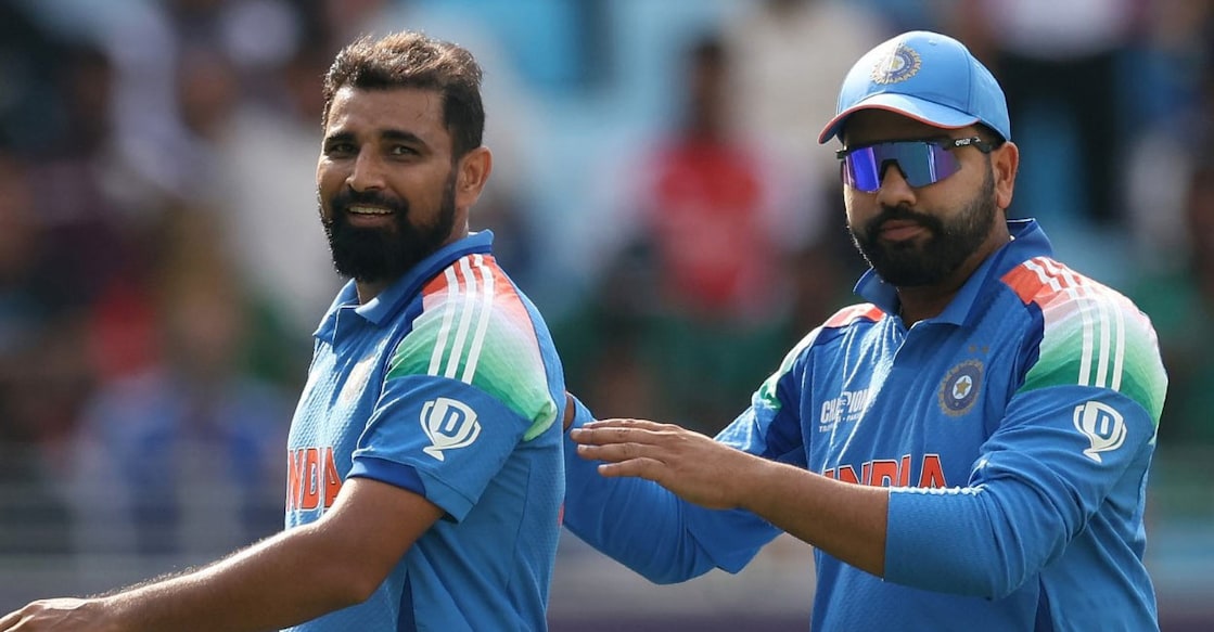 mohammed-shami-rohit-sharma അഞ്ച് വിക്കറ്റുകൾ വീഴ്ത്തിയ മുഹമ്മദ് ഷമിയെ അഭിനന്ദിക്കുന്ന രോഹിത് ശർമ. Photo: X@BCCI