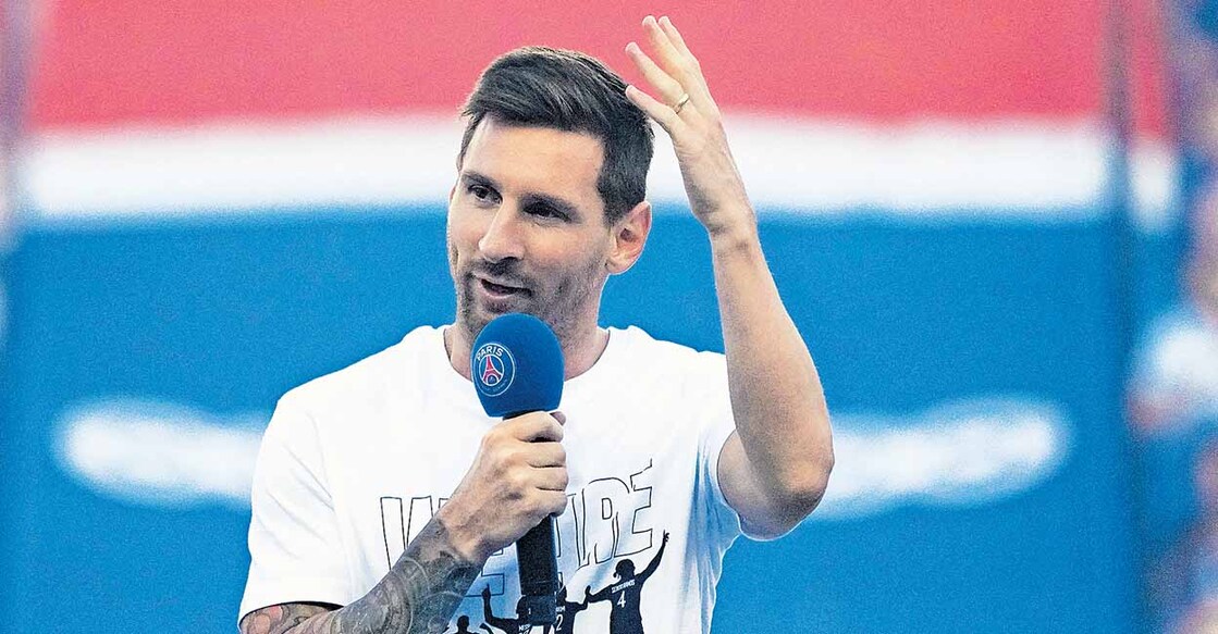 PSG's Lionel Messi speaks during players presentation before the French League One soccer match between Paris Saint Germain and Strasbourg, at the Parc des Princes stadium in Paris, Saturday, Aug. 14, 2021. (AP Photo/Francois Mori)