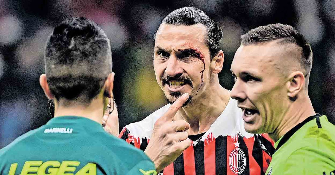 FBL-ITA-SERIEA-AC MILAN-BOLOGNA AC Milan's Swedish forward Zlatan Ibrahimovic reacts after being injured following a collision during the Italian Serie A football match between AC Milan and Bologna on April 4, 2022 at the San Siro stadium in Milan. (Photo by MIGUEL MEDINA / AFP)