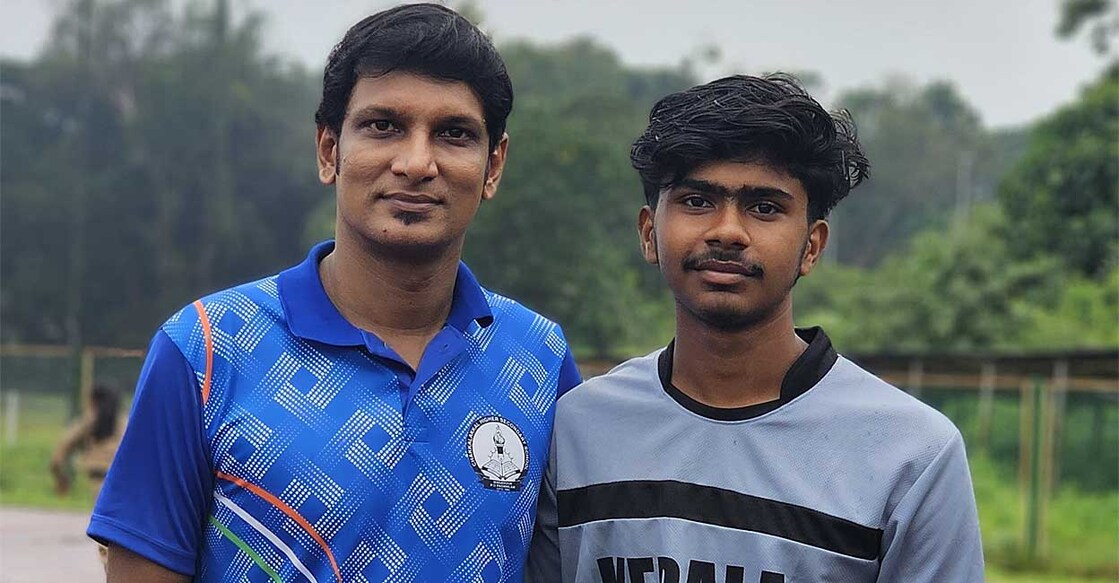 അധ്യാപകൻ എം.അബ്‌ദുൽ അലി മുഹമ്മദ് അഫ്‌സലിനൊപ്പം