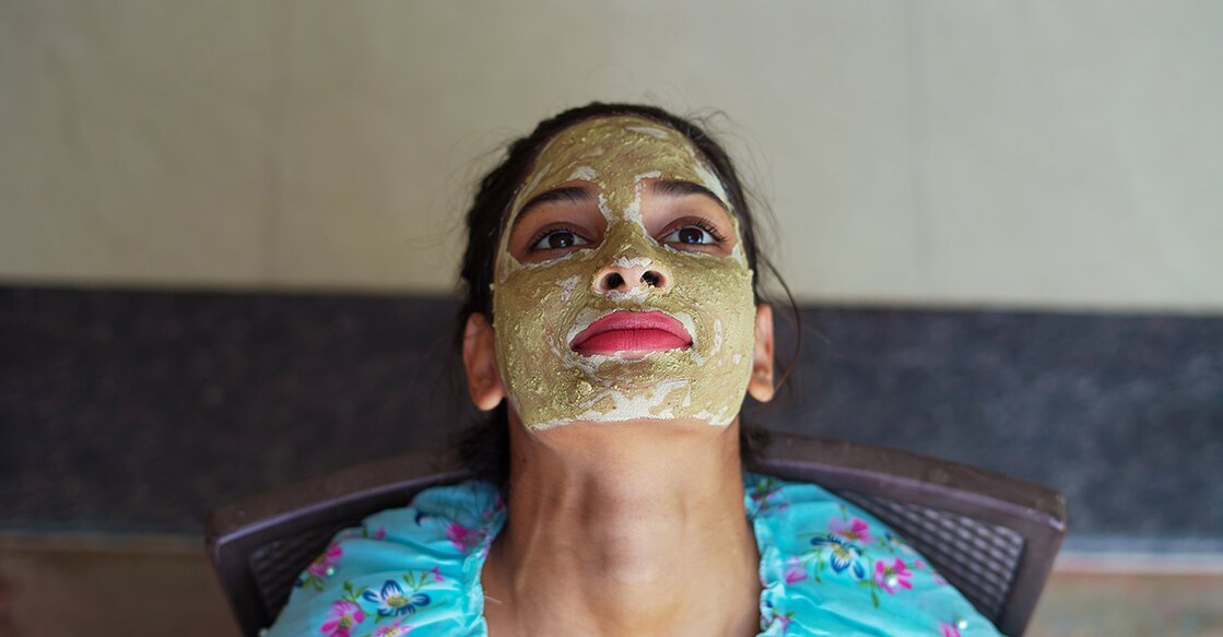 Woman using homemade facial mask on face. Photo By: www.shutterstock.com/Azay photography