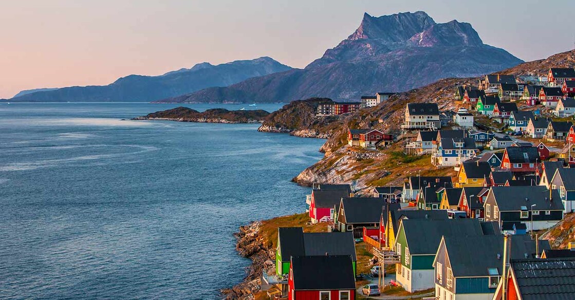 Colorfull houses at sunset in the capital of Greenland, Nuuk. Image Credit: KimKimsenphot/istockphoto