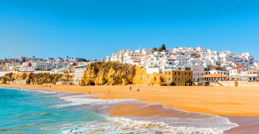 wide-sandy-beach-white-city-albufeira wide-sandy-beach-white-city-albufeira