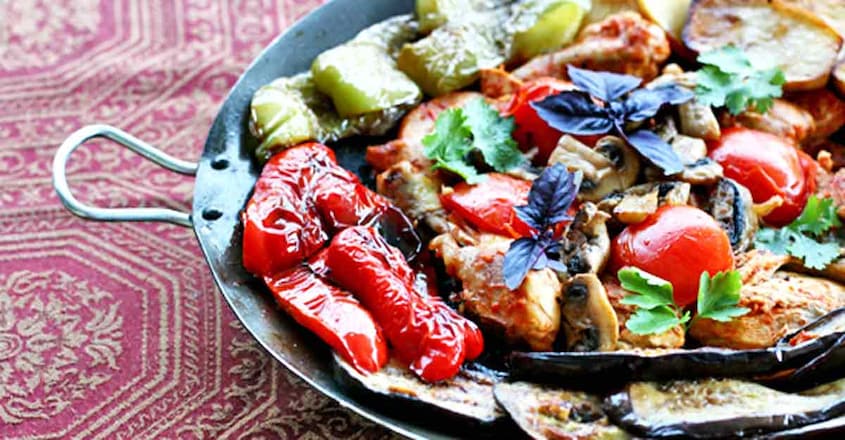 Saj-cooked chicken with vegetables Saj-cooked chicken with vegetables